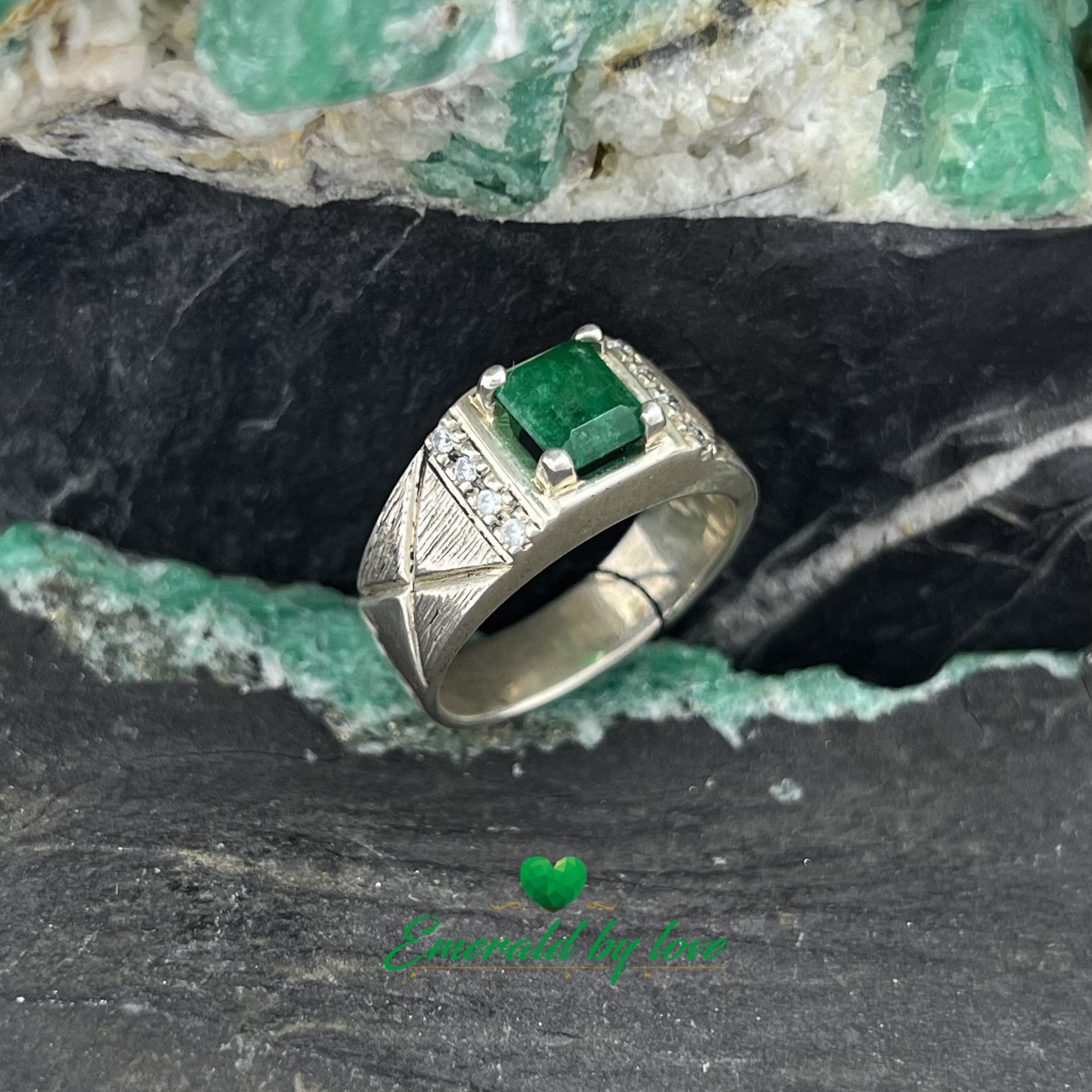 Elegant Silver Ring with Rectangular Emerald and Decorative Zircon Lines