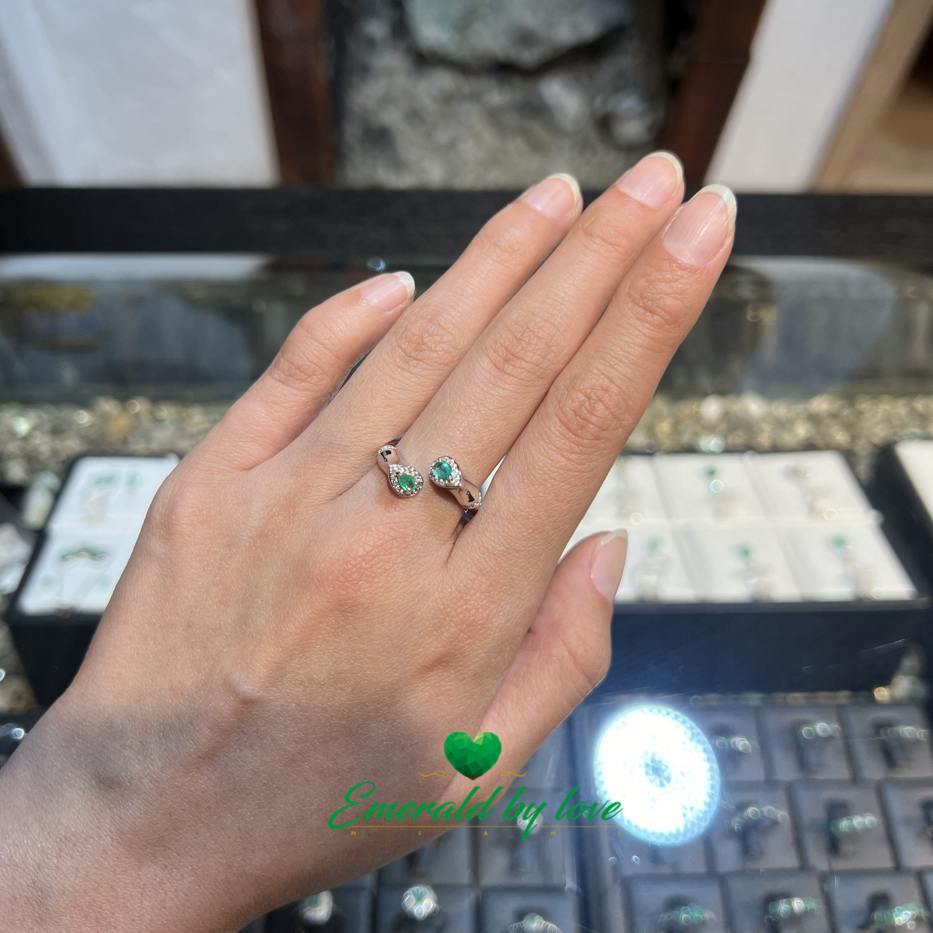 Double Teardrop Ring with Emeralds and Decorative Zircon Accents