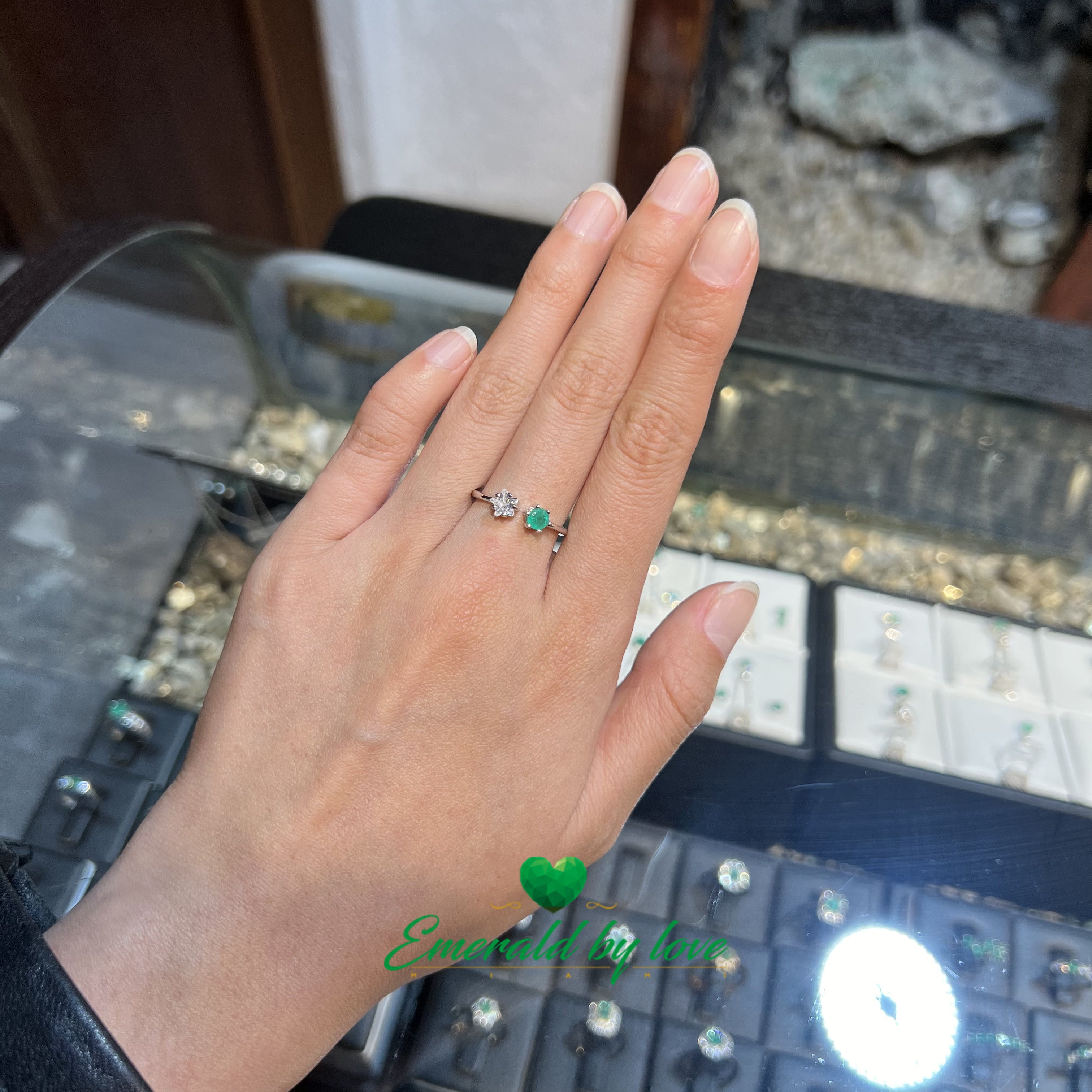 Double Point Ring with White Zircon Star and Round Emerald