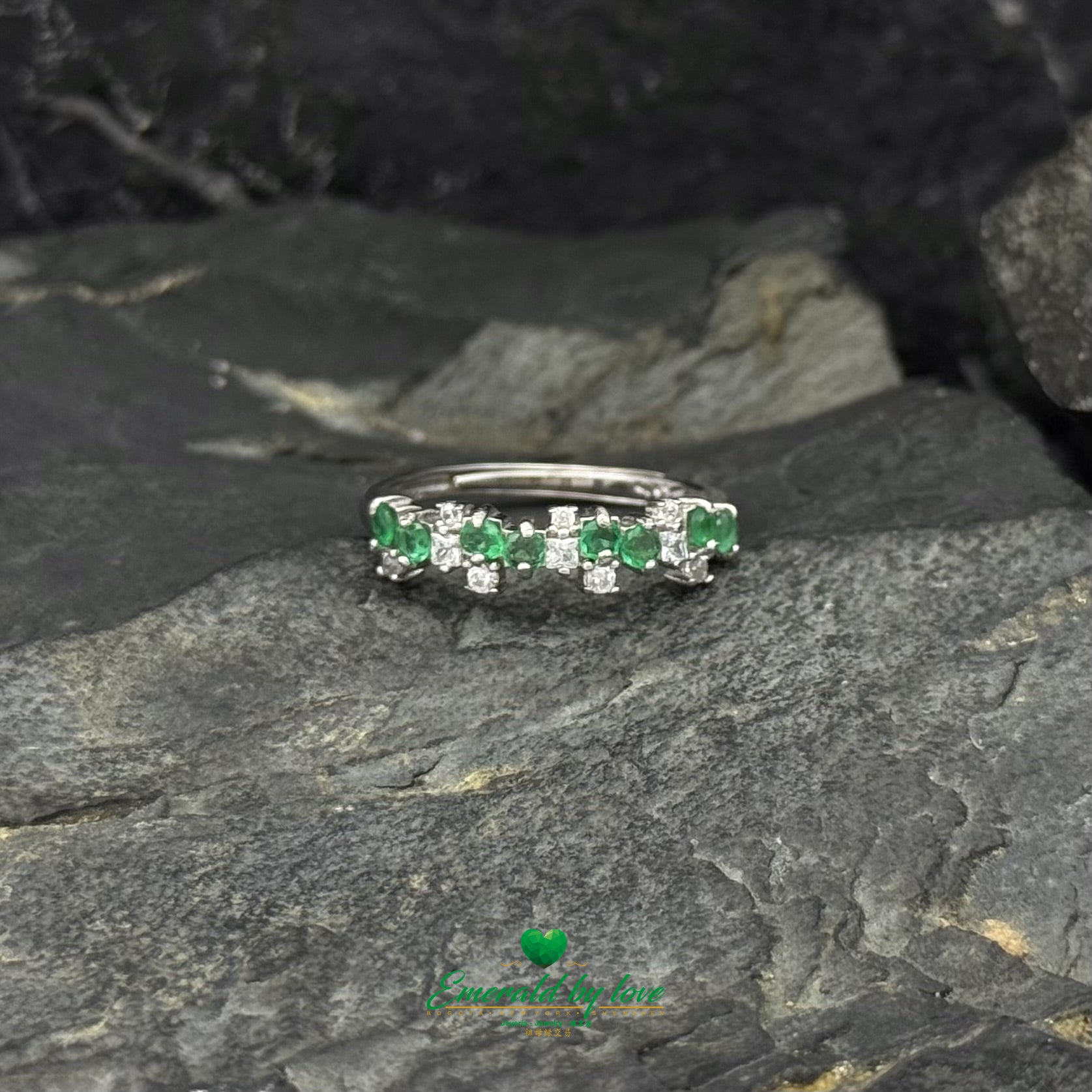 Sterling Silver Crazy Band Ring with Two Emeralds and Scattered Cubic Zirconia