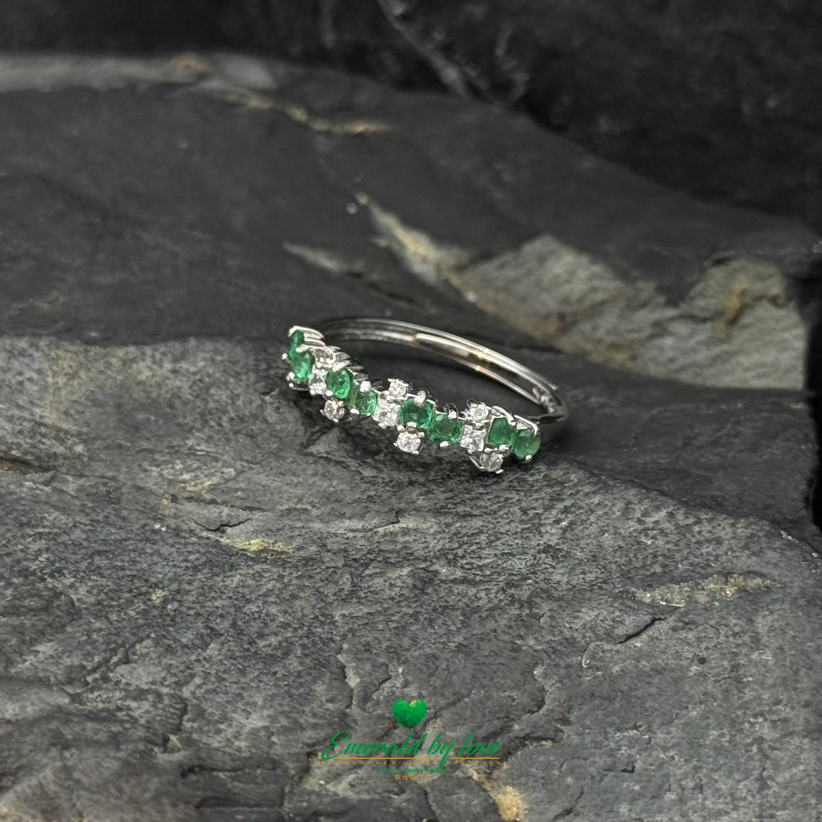Sterling Silver Crazy Band Ring with Two Emeralds and Scattered Cubic Zirconia