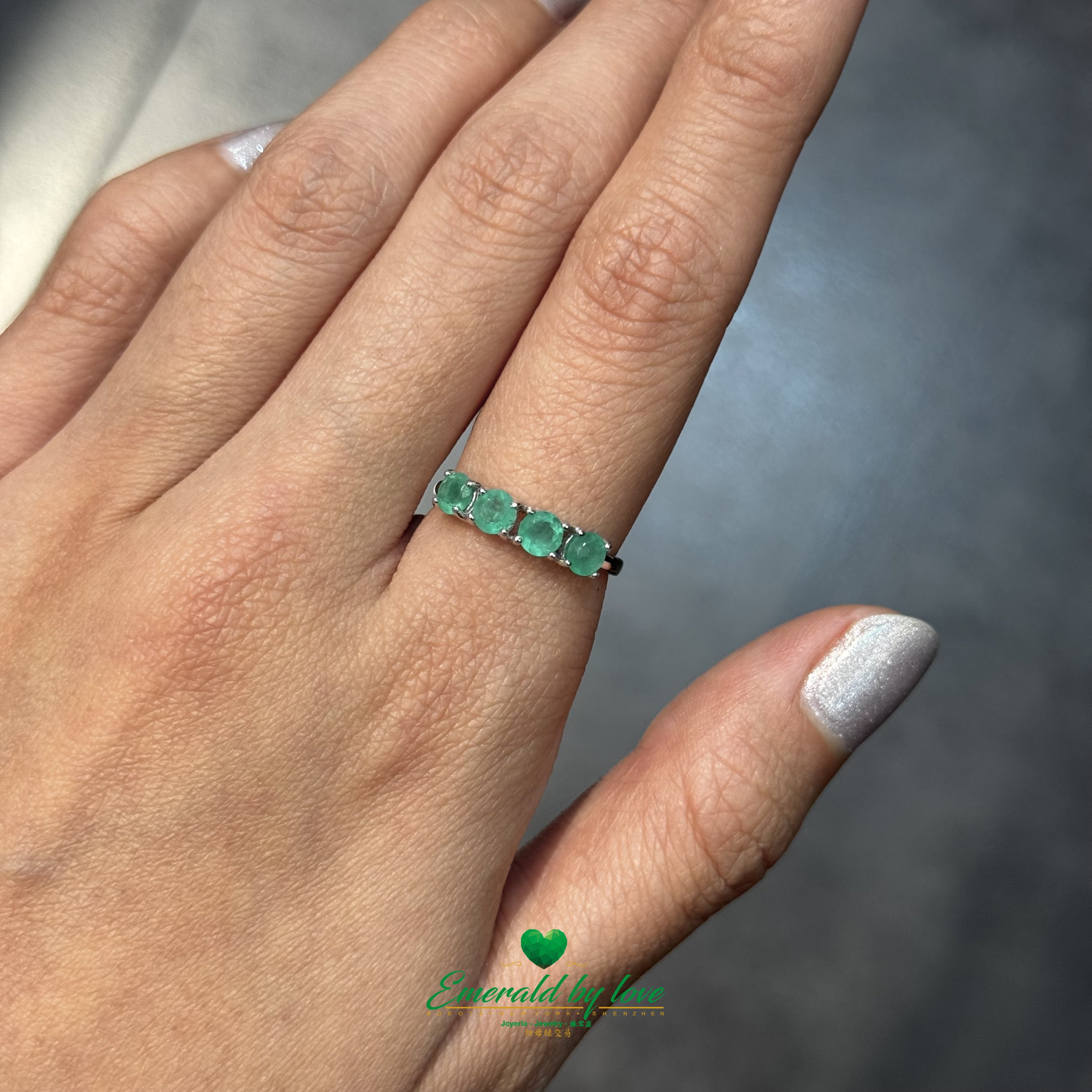 Sterling Silver Band Ring with Four Round Emeralds
