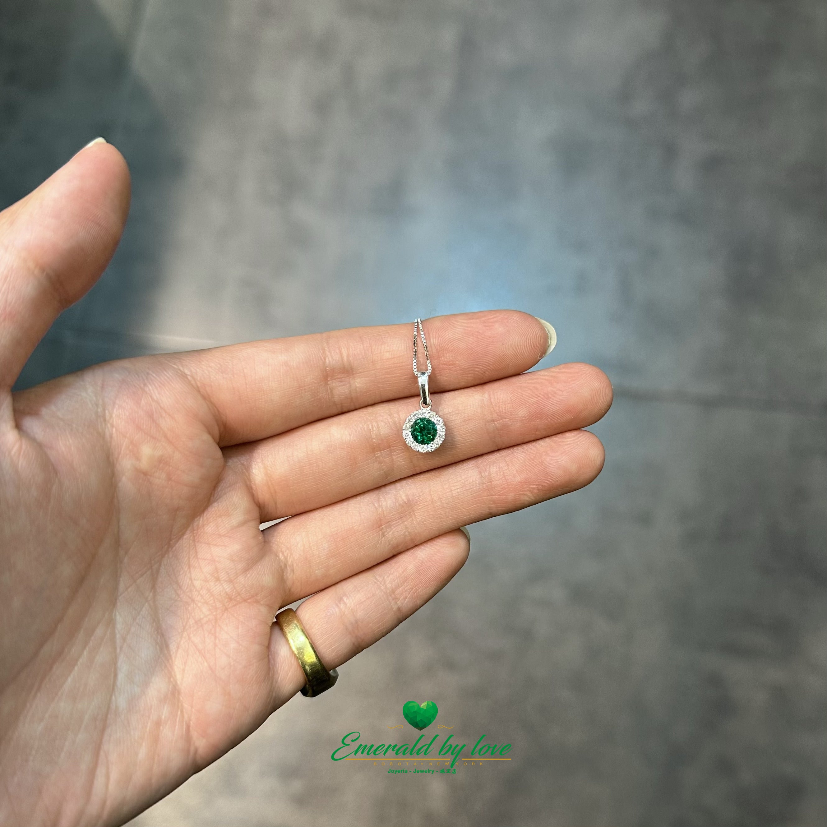 White Gold Ring, Earrings, and Pendant Set with High-Quality Round Emeralds and Diamond Accents