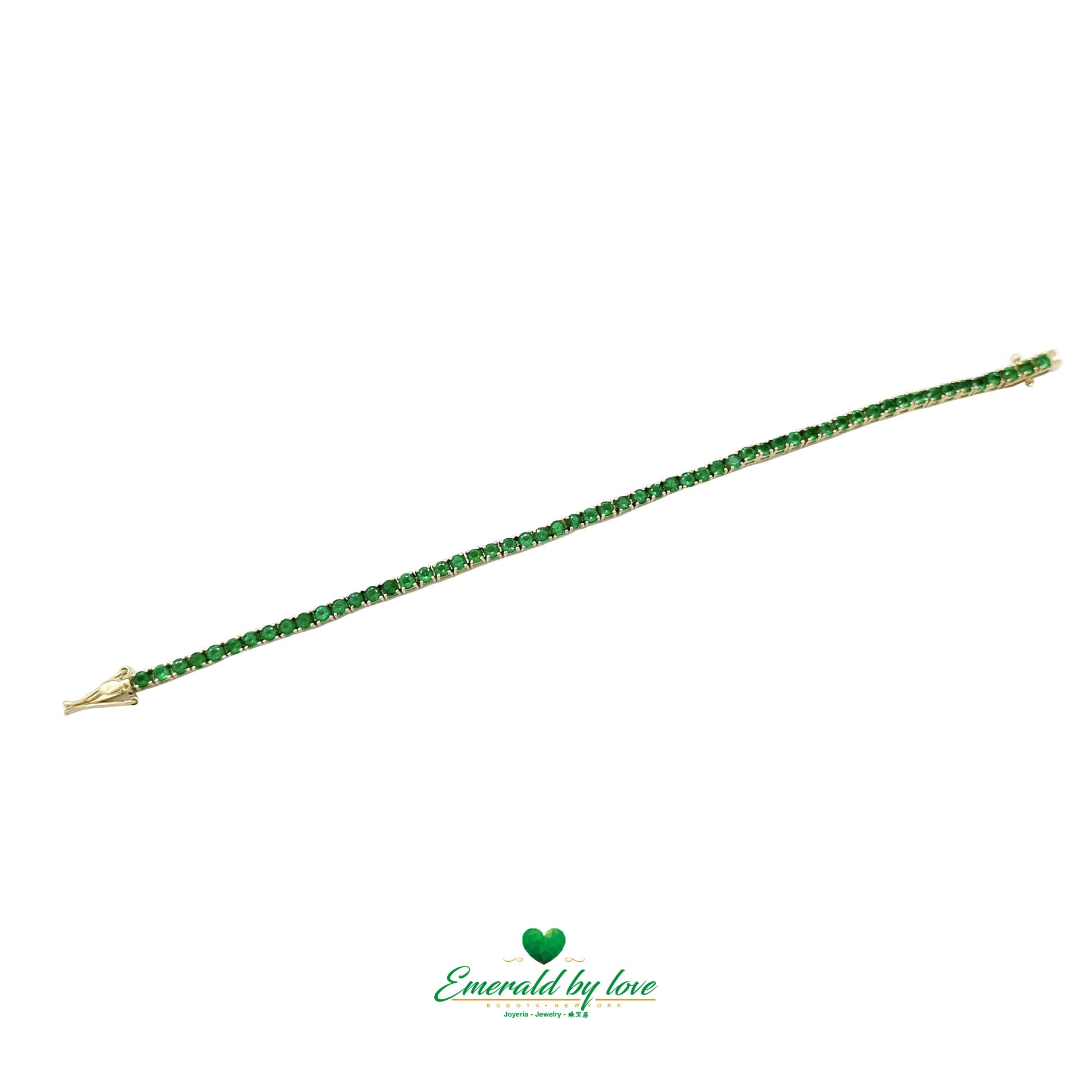  Slim tennis bracelet with Colombian emeralds set in 18K yellow gold
