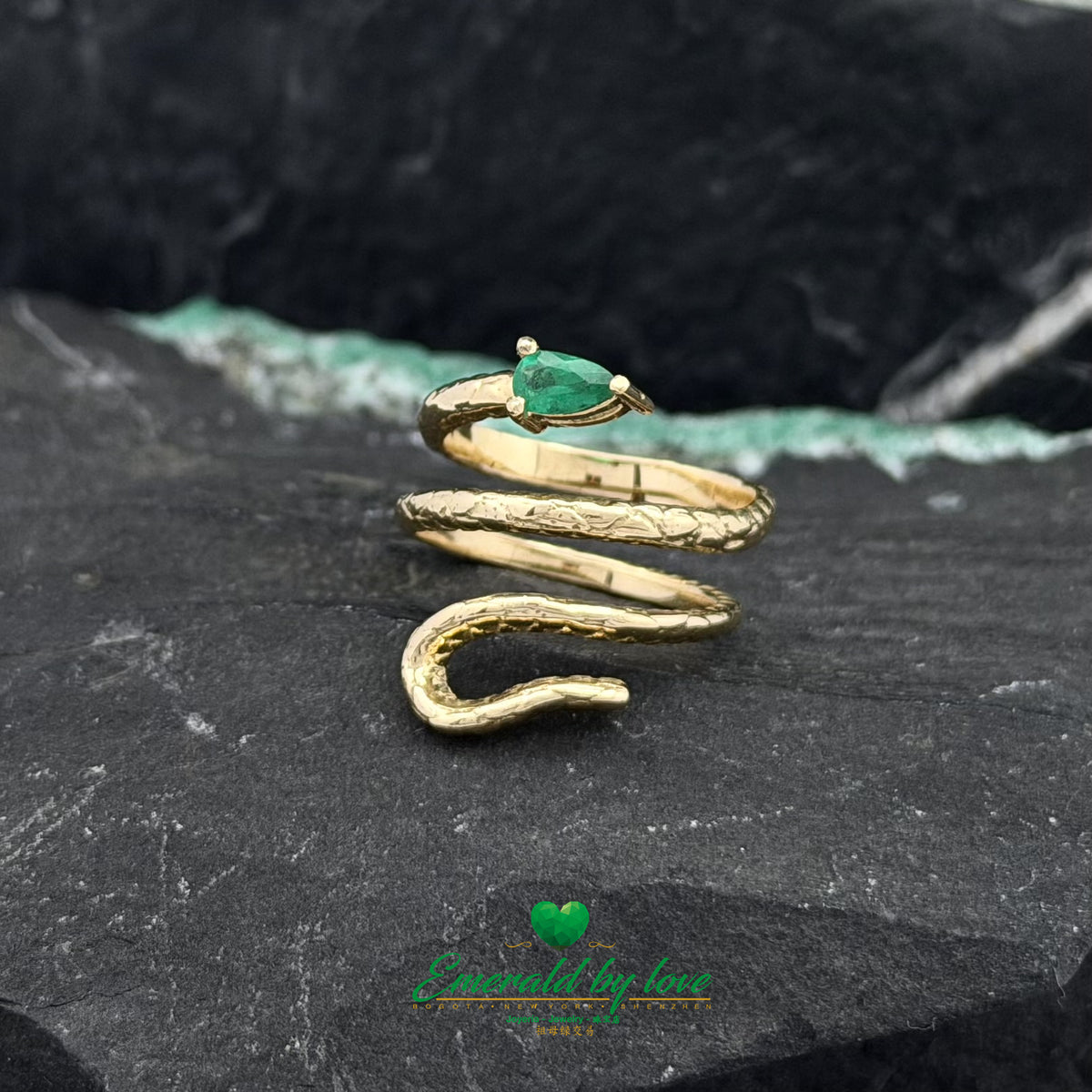 Snake Wrap Ring Featuring a Pear-Shaped Emerald