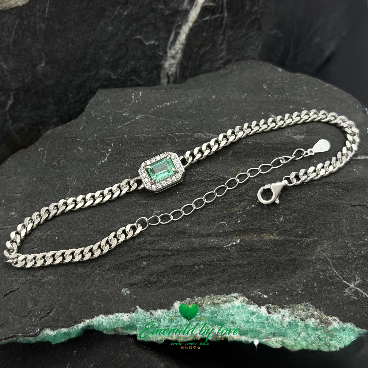 Sterling Silver Bracelet Featuring a Baguette-Cut Crystal Emerald and Zircons