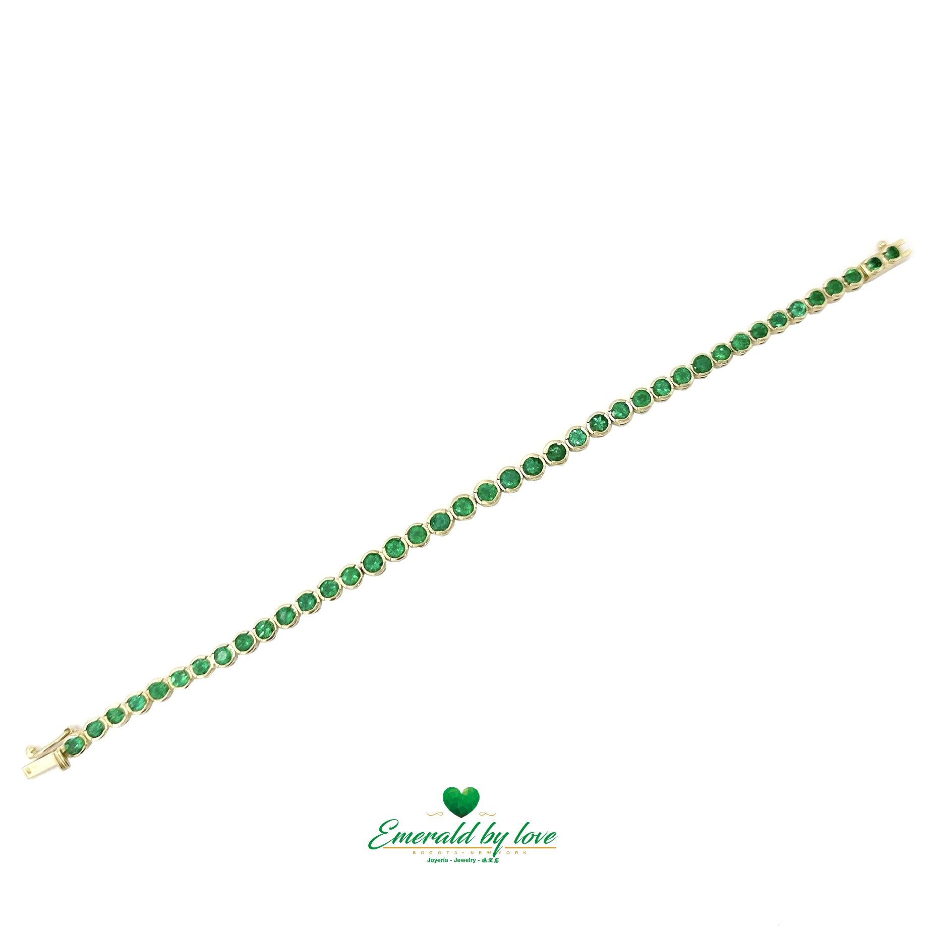 Tennis bracelet with bezel-set Colombian emeralds in 18K yellow gold