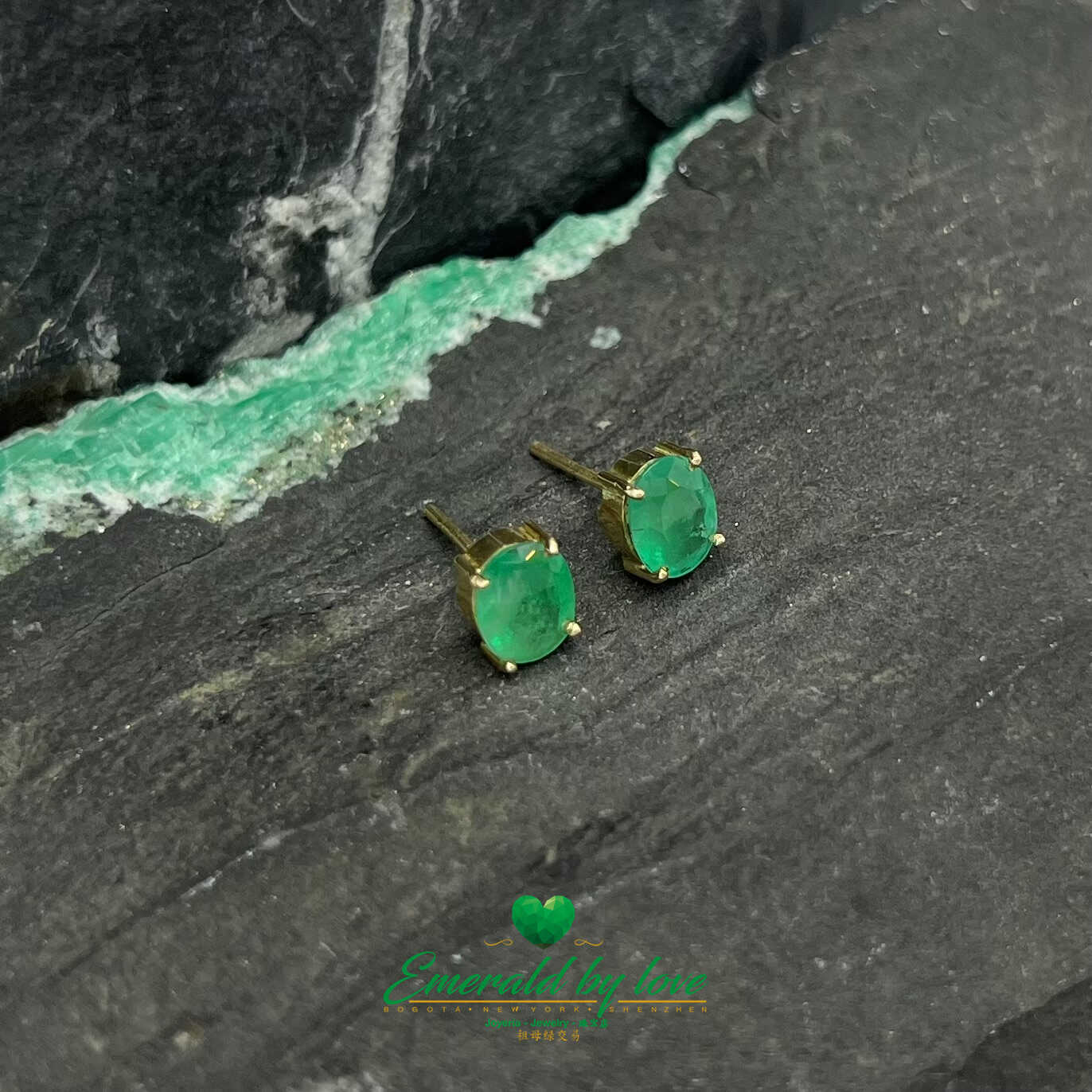 Timeless Radiance: Yellow Gold Oval Emerald Earrings 4.62 TCW