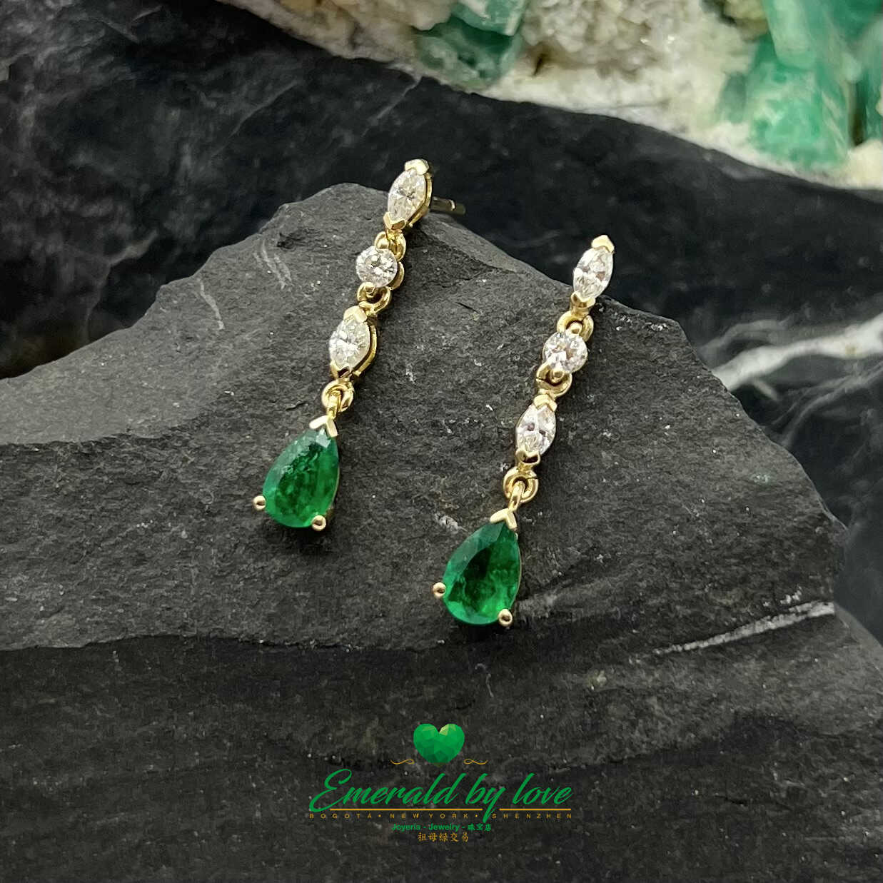 Gilded Harmony: 18K Yellow Gold Earrings with 1.35 TCW Pear-shaped Emeralds - Diamonds