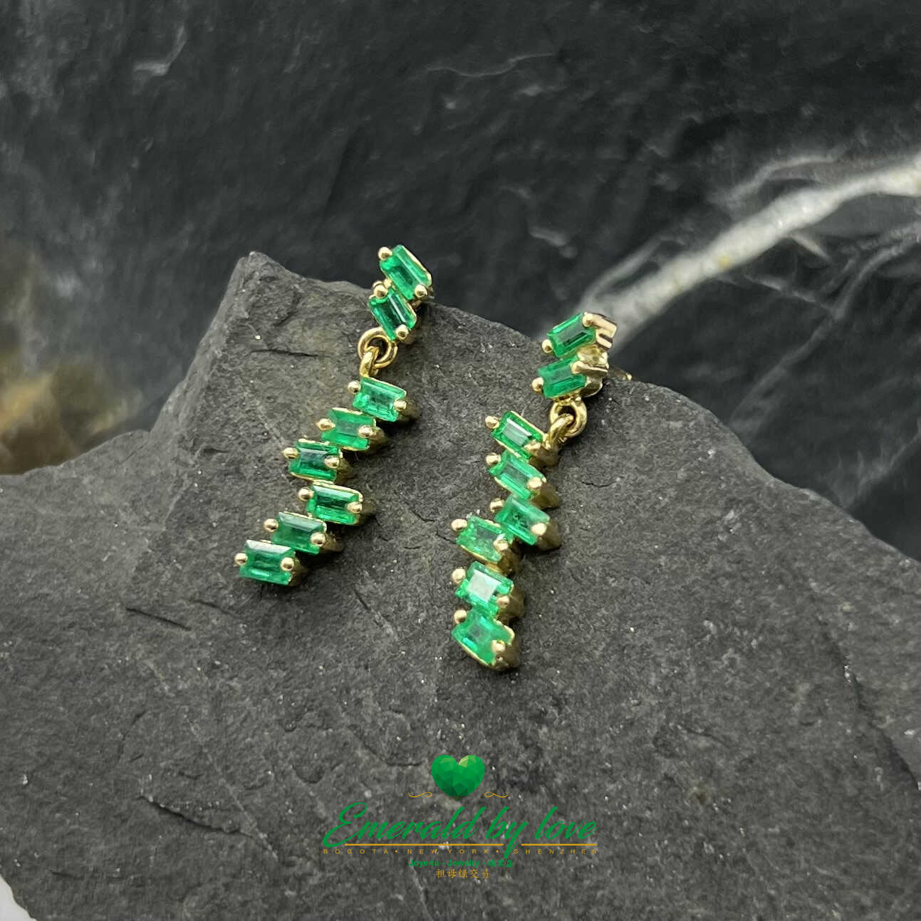 Golden Gleam: 18K Yellow Gold Earrings with Approximate 1.0 TCW Baguette Emeralds