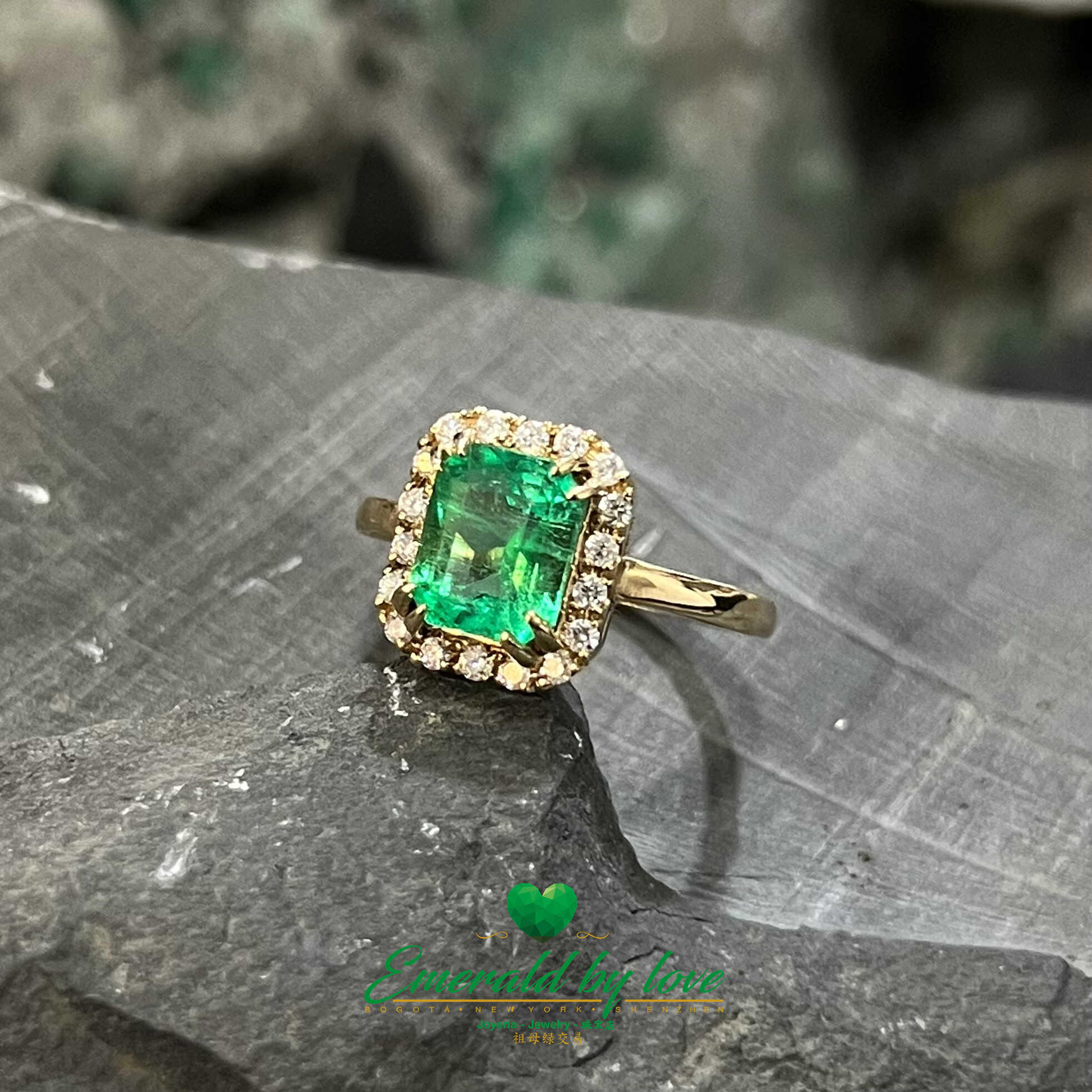 Emerald Engagement Ring: 2.1 CT Center Stone Surrounded by Diamonds