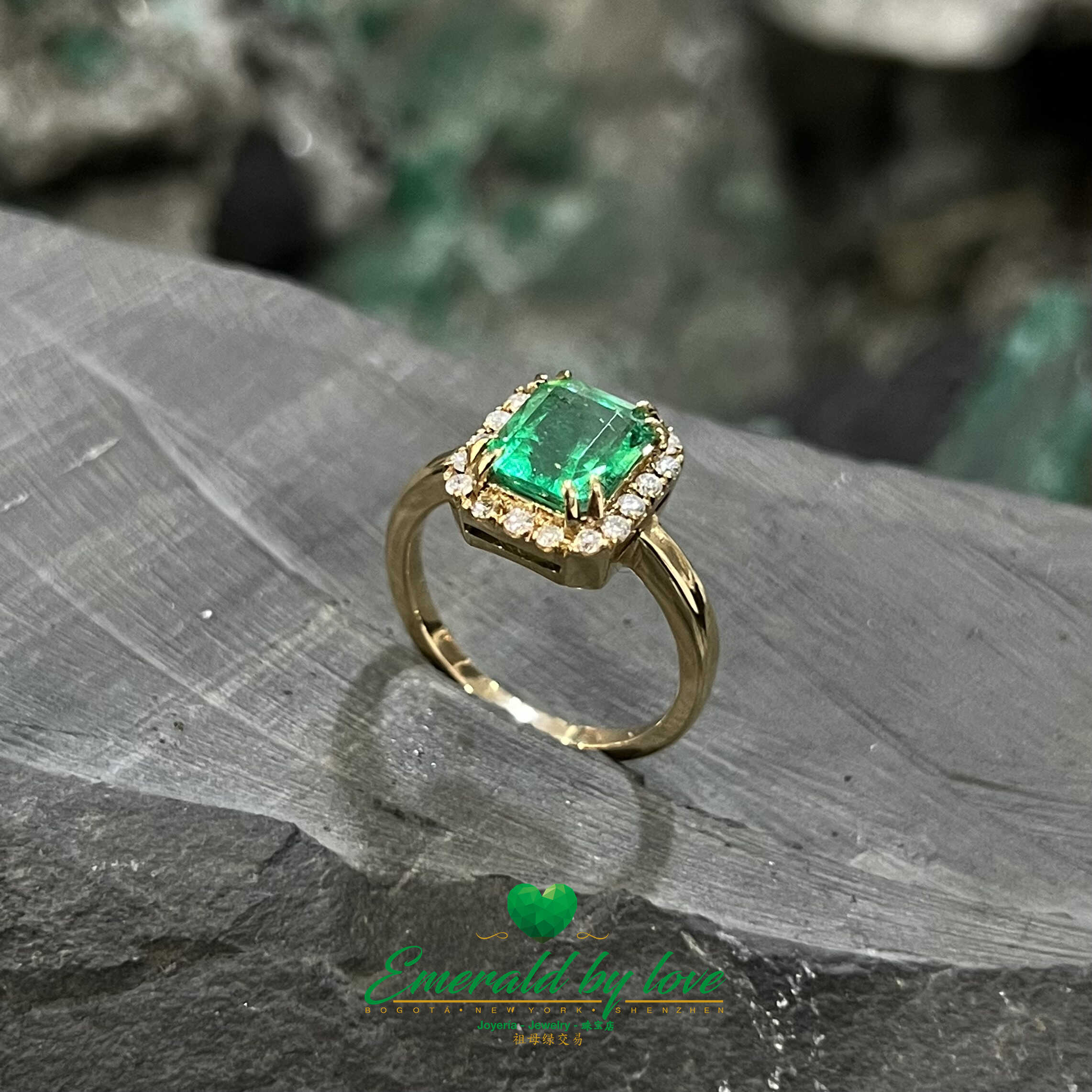 Emerald Engagement Ring: 2.1 CT Center Stone Surrounded by Diamonds