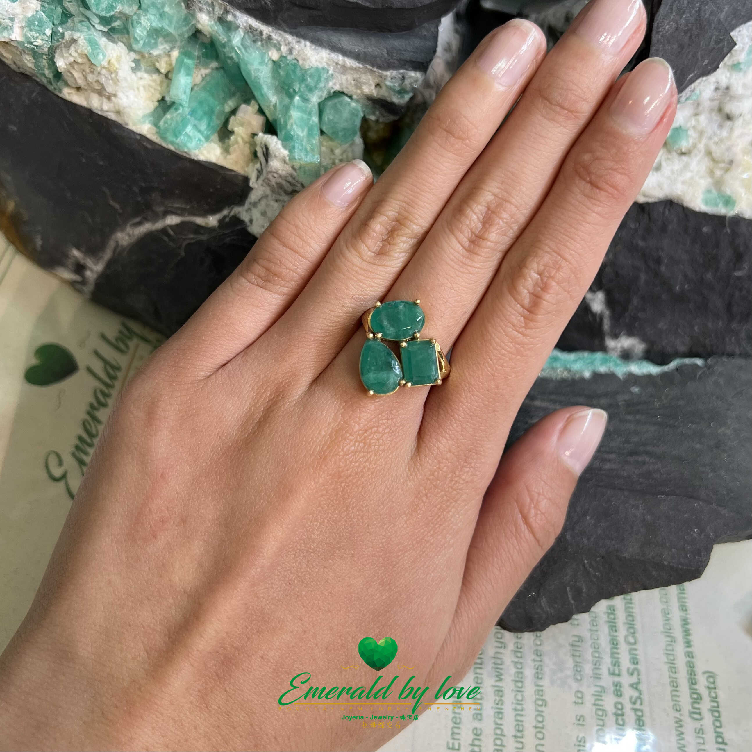 Trilogy of Elegance: Yellow Gold Ring with Three Colombian Emeralds