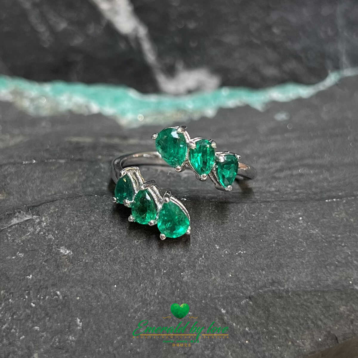 Sleek White Gold Ring: 1.31 TCW Teardrop Emeralds for a Stylish Modern Look