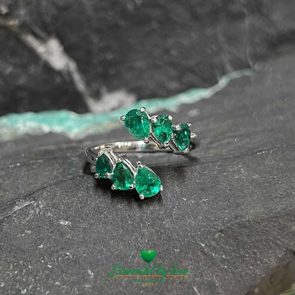 Sleek White Gold Ring: 1.31 TCW Teardrop Emeralds for a Stylish Modern Look