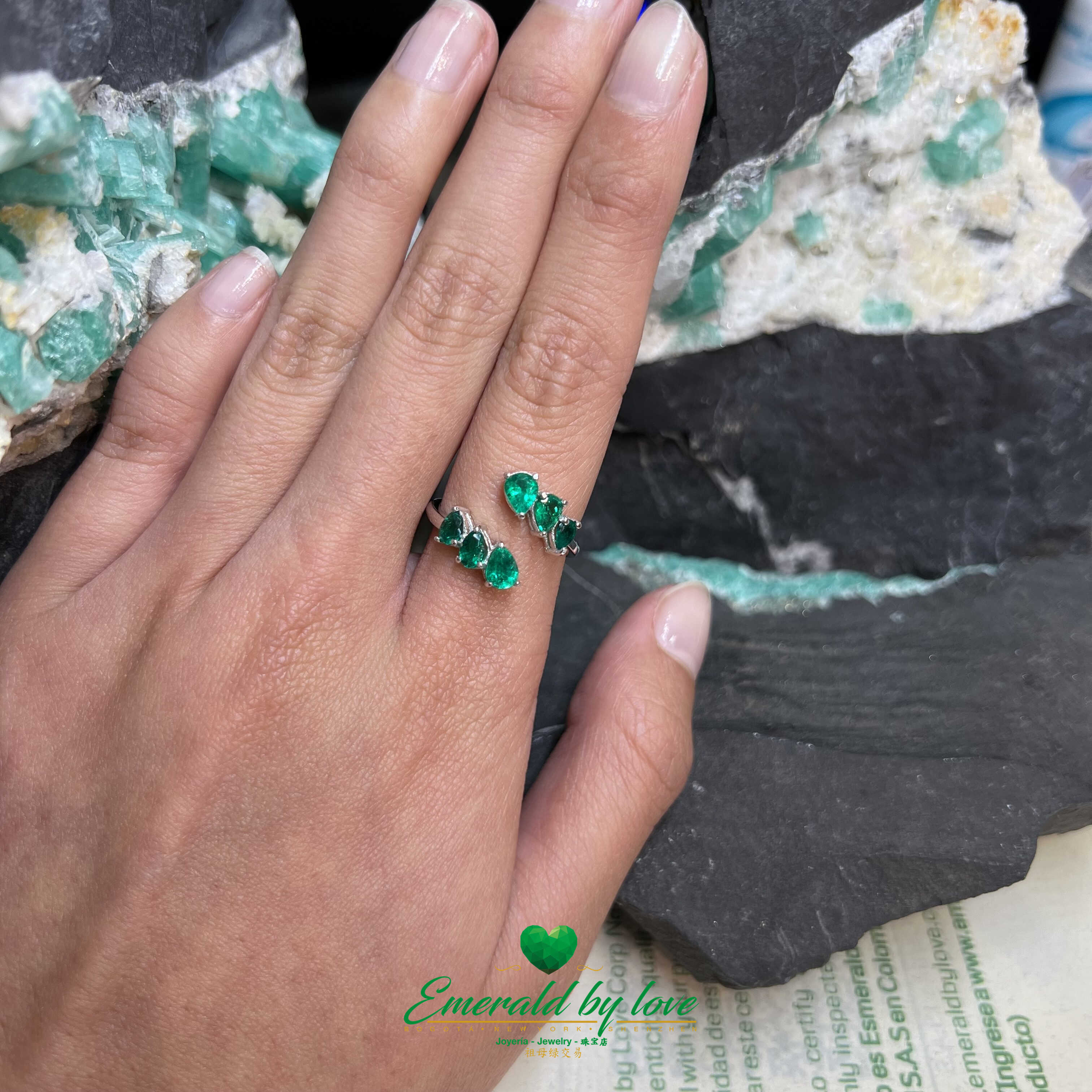 Sleek White Gold Ring: 1.31 TCW Teardrop Emeralds for a Stylish Modern Look