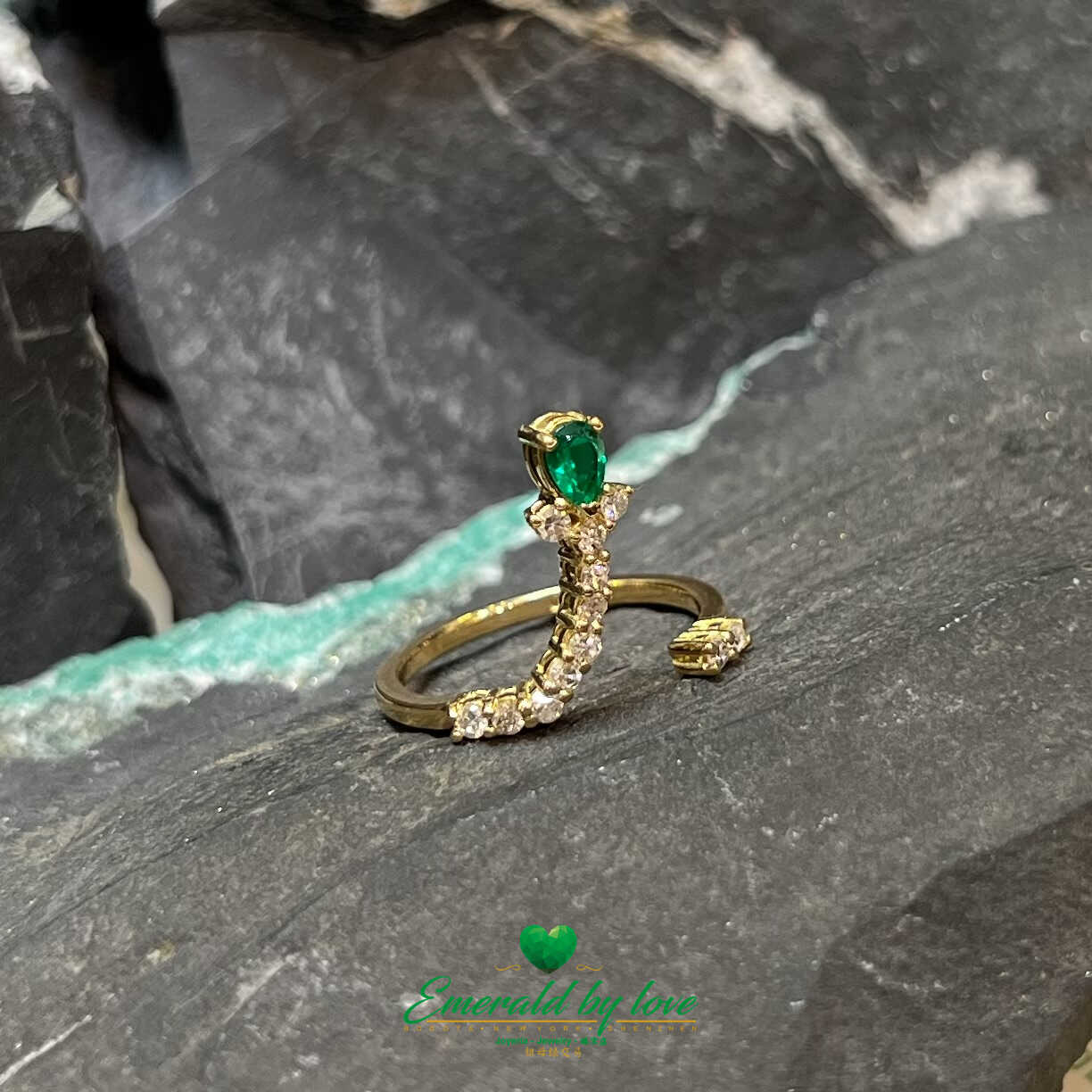 Elegant Yellow Gold Ring with 0.36 Ct Teardrop Emerald - A Touch of Natural Sophistication