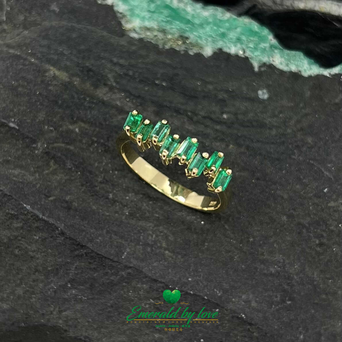 Beautiful Yellow Gold Ring with Uniformly Designed Baguette Emeralds