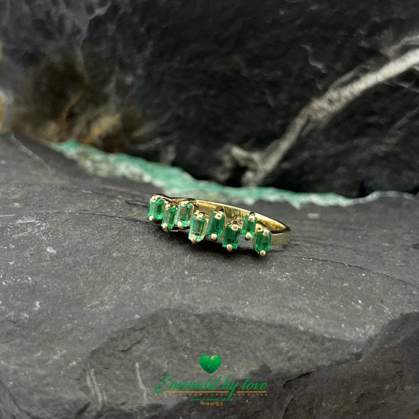 Beautiful Yellow Gold Ring with Uniformly Designed Baguette Emeralds
