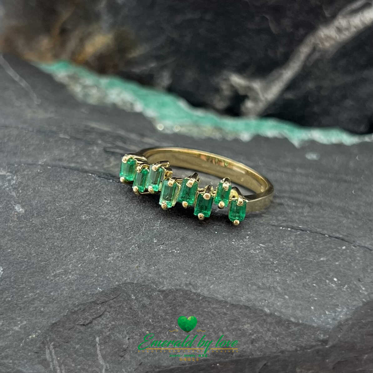 Beautiful Yellow Gold Ring with Uniformly Designed Baguette Emeralds