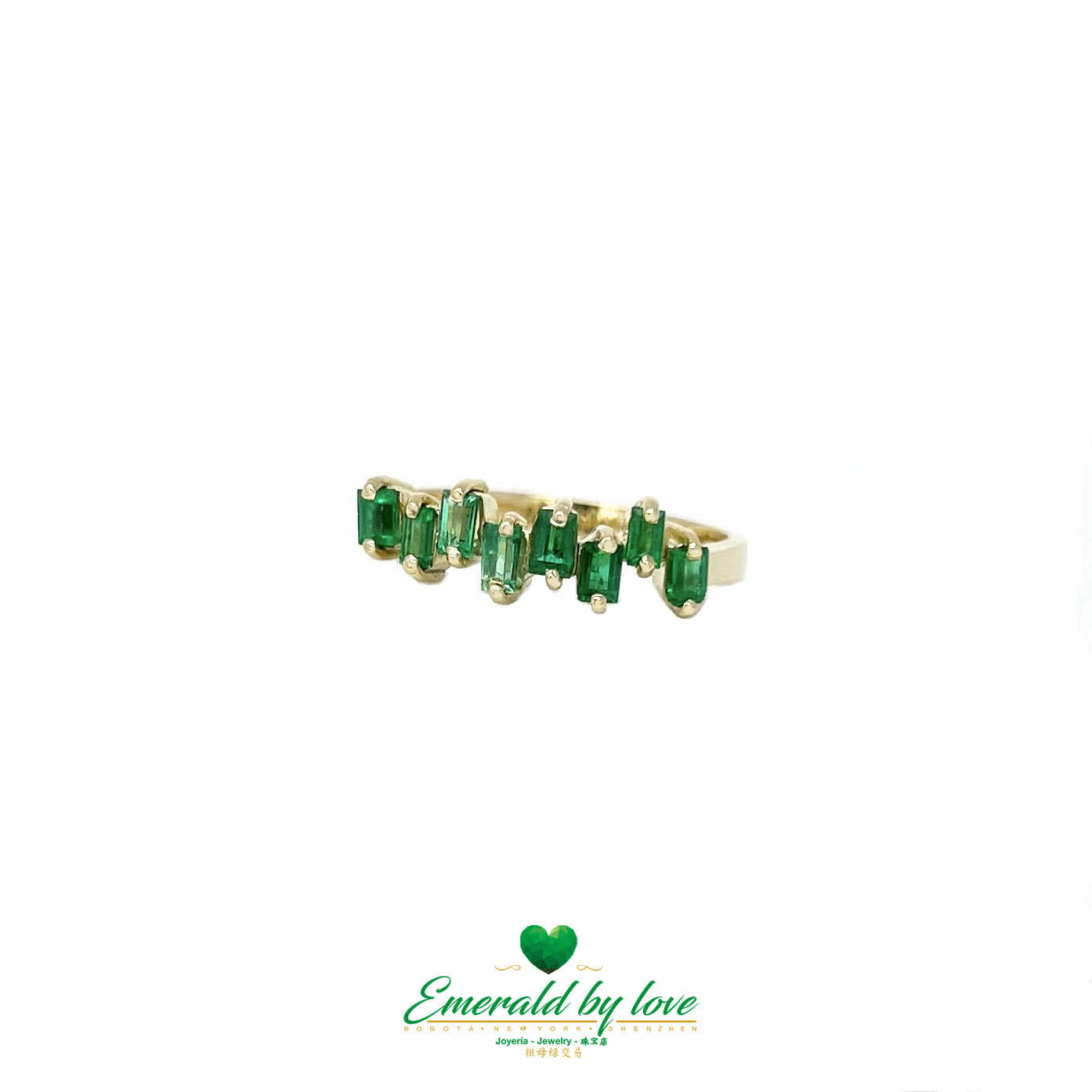 Beautiful Yellow Gold Ring with Uniformly Designed Baguette Emeralds
