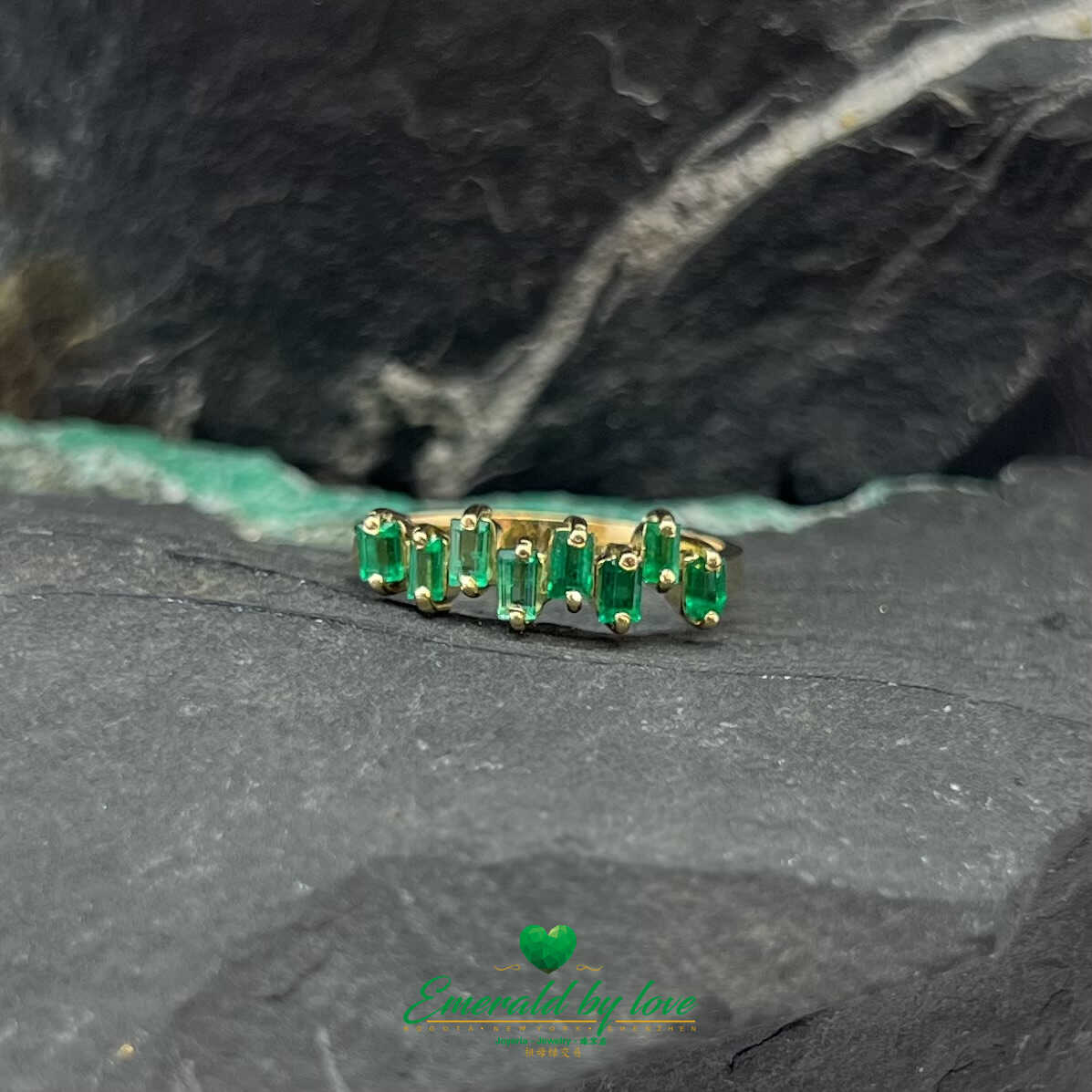 Beautiful Yellow Gold Ring with Uniformly Designed Baguette Emeralds