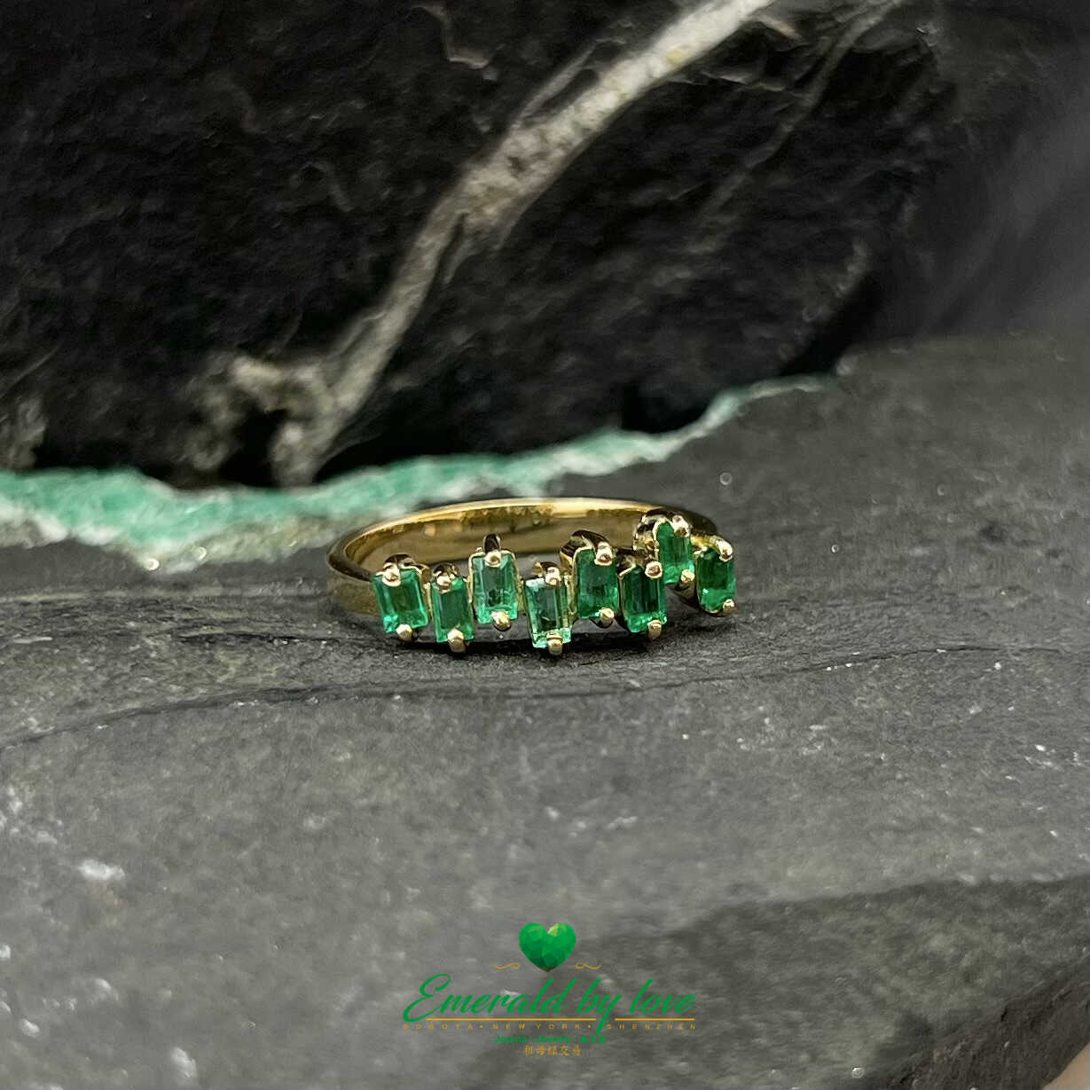 Beautiful Yellow Gold Ring with Uniformly Designed Baguette Emeralds