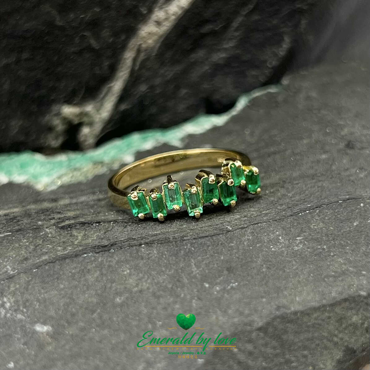 Beautiful Yellow Gold Ring with Uniformly Designed Baguette Emeralds