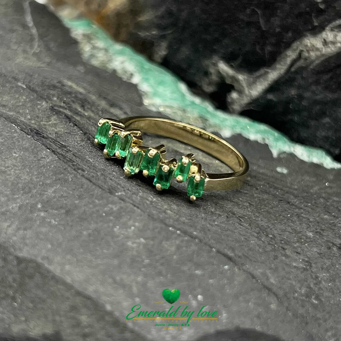 Beautiful Yellow Gold Ring with Uniformly Designed Baguette Emeralds